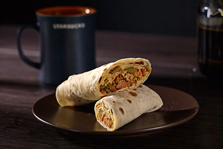 Spanish Omelette Wrap (P160). This tortilla wrap is filled with egg, chorizo, ground pork, potato, tomatoes, and bell pepper.
